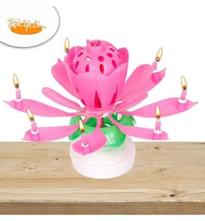 bougie-d'annniversaire,-célébration,-à-ouverture-spectaculaire-chantant-pour-une-ambliance-festive,-décoration-de-gâteaux-créative-avec-musique---rose